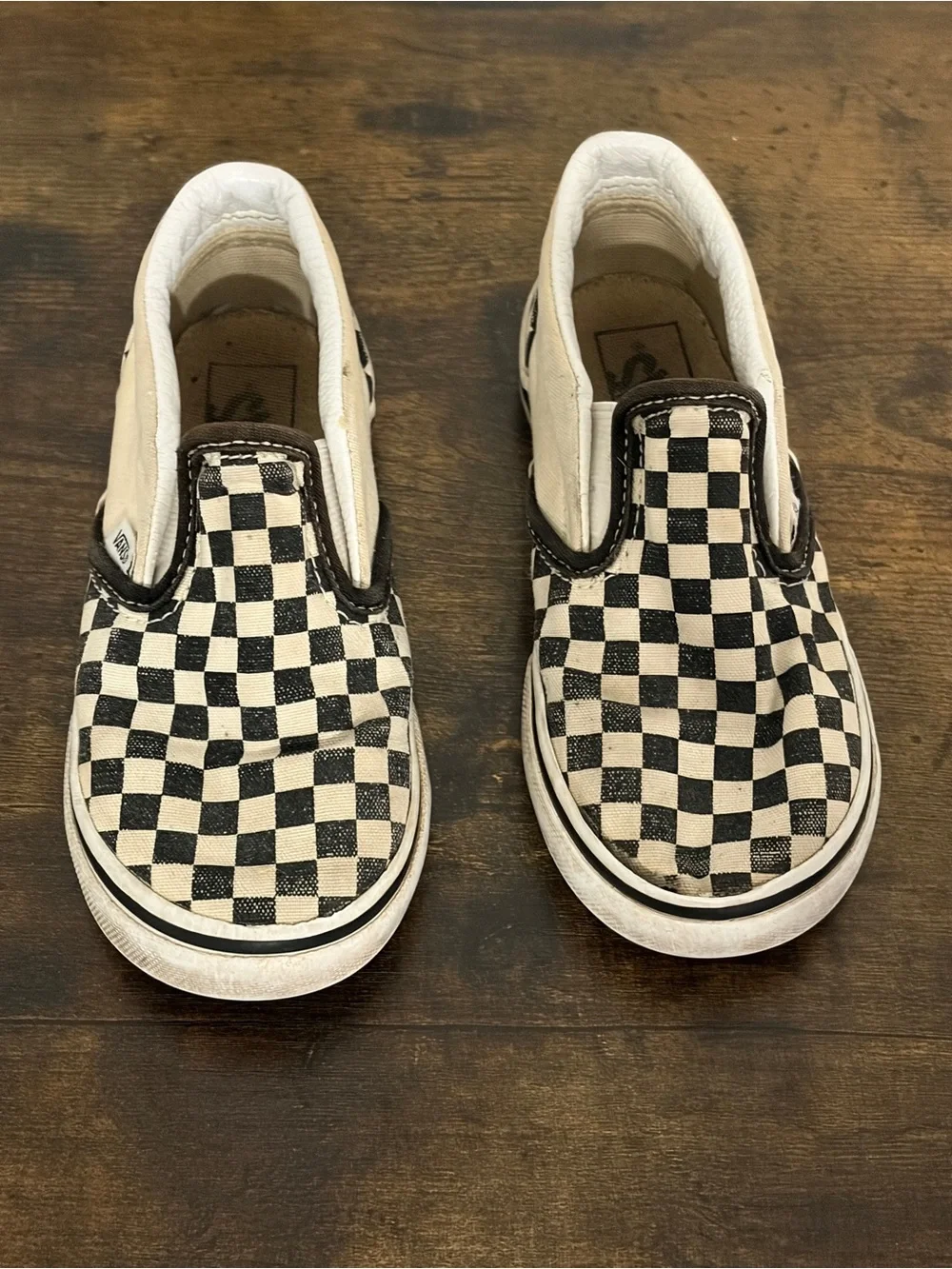 Vans Kids Slip-On Checkerboard Sneakers in Black and Cream